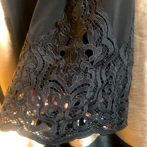 Wide leg pant with lace trim bottoms